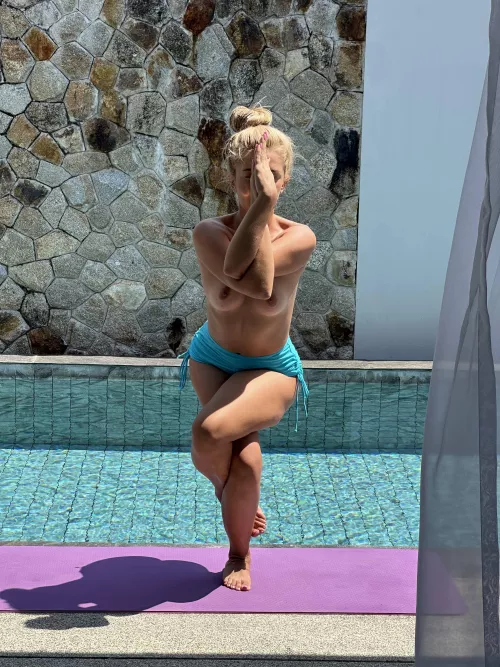 Naked poolside meditation