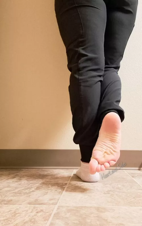 naughty nurse at work sneaking feet pics