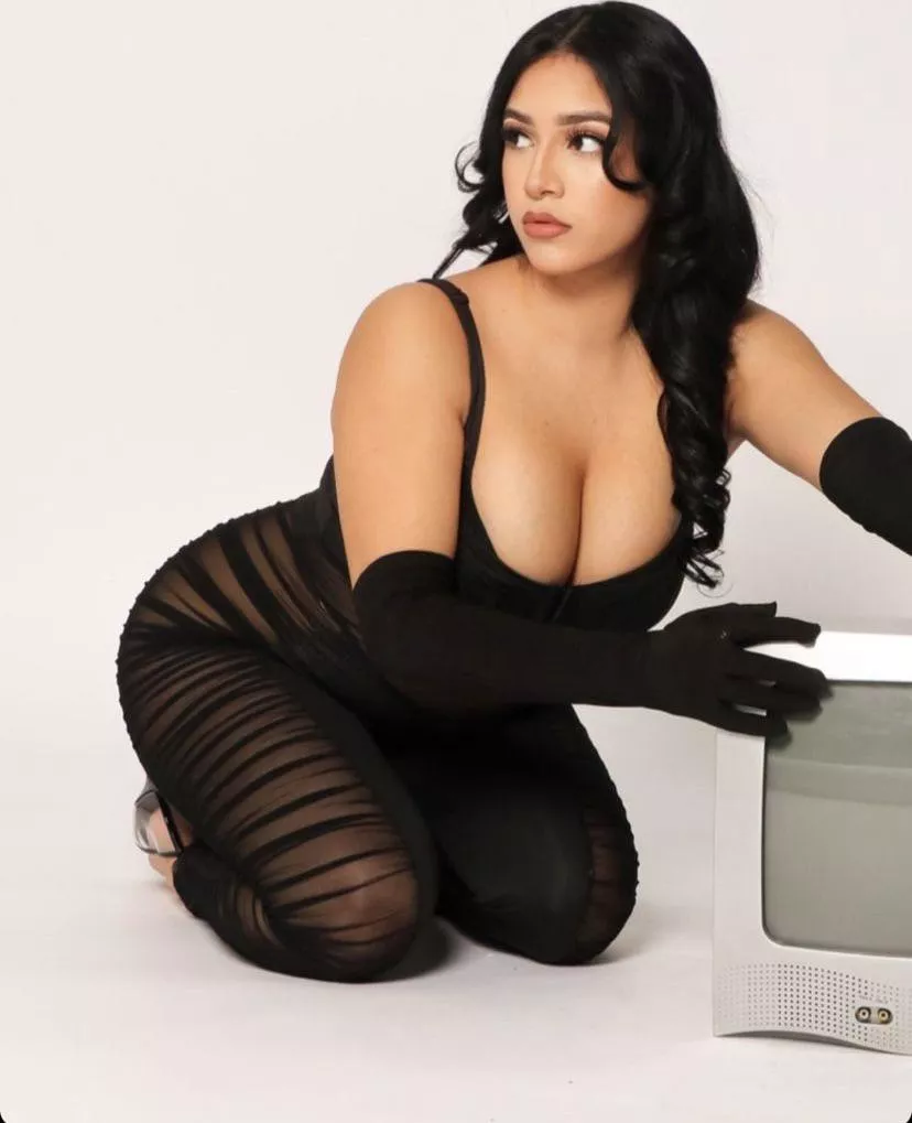 On her knees
