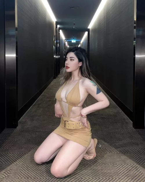 On her knees