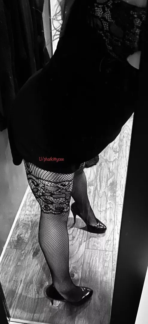 Partially bent over in black dress, wearing crotchless stockings and heels 👠. Would you like?