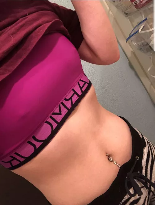 Pierced in the sports bra