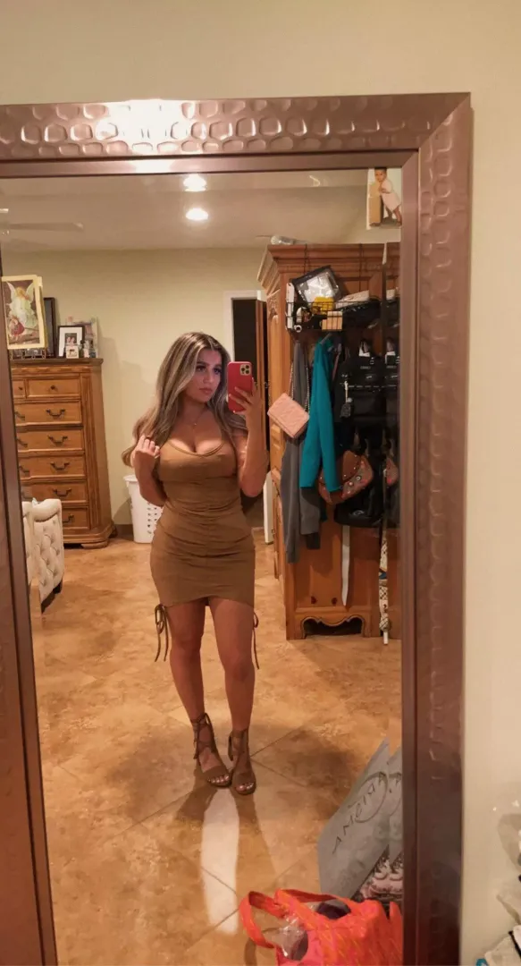 Pierced nipples Latina in a tight dress