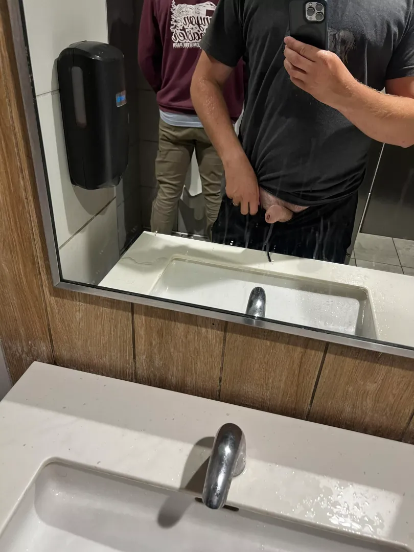Pulling dick out with someone behind me at the urinal