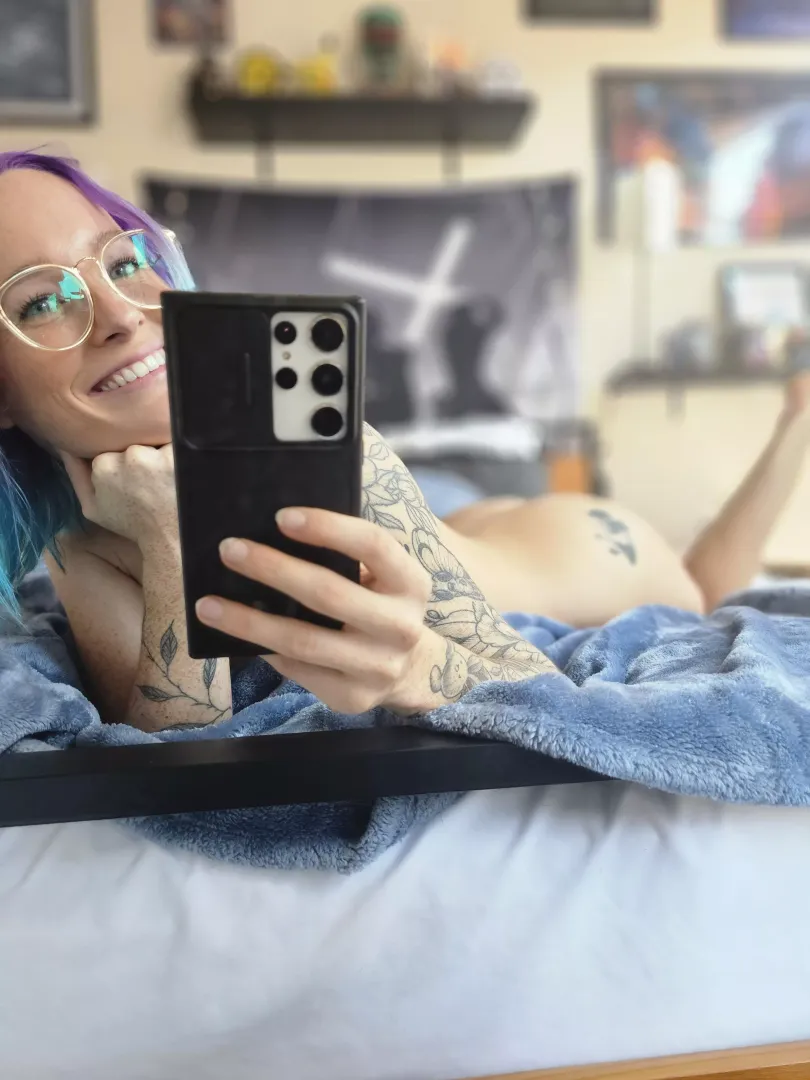 Purple haired tattooed freckleface 🤓