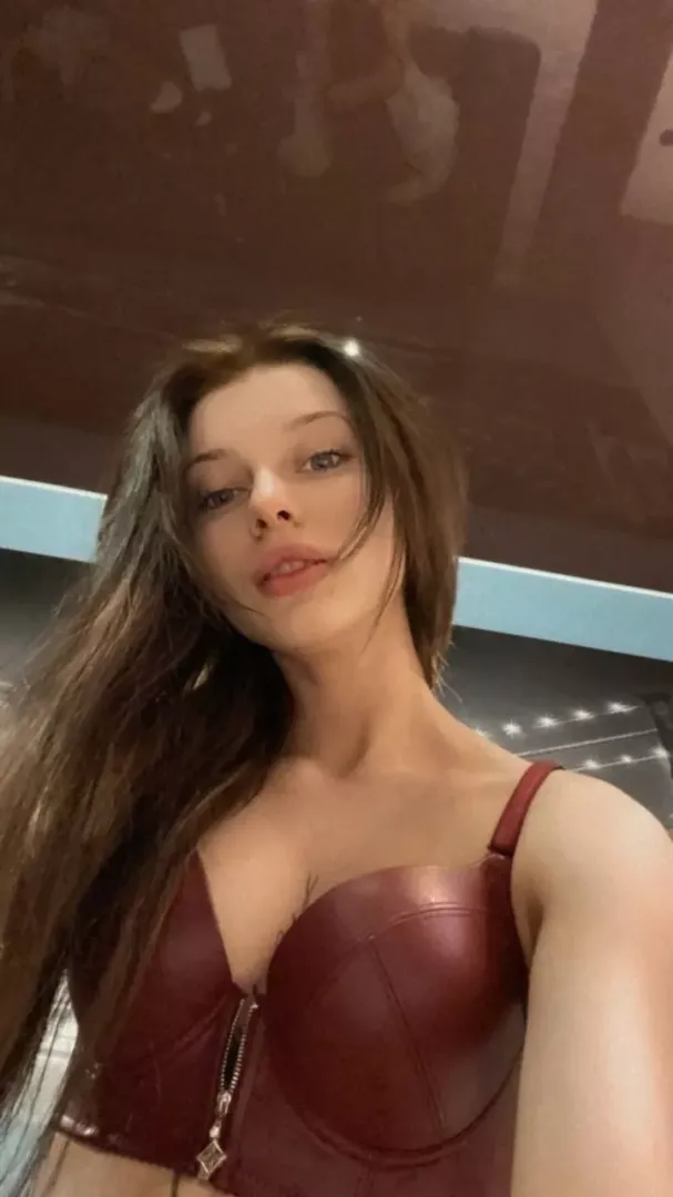 Reach over to unzip my bra ;)