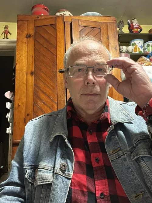 Reading-Writer adjusting his glasses.