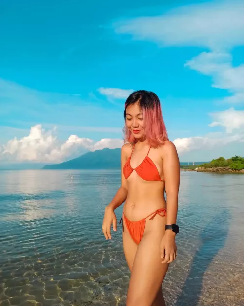 Red bikini against blue skies