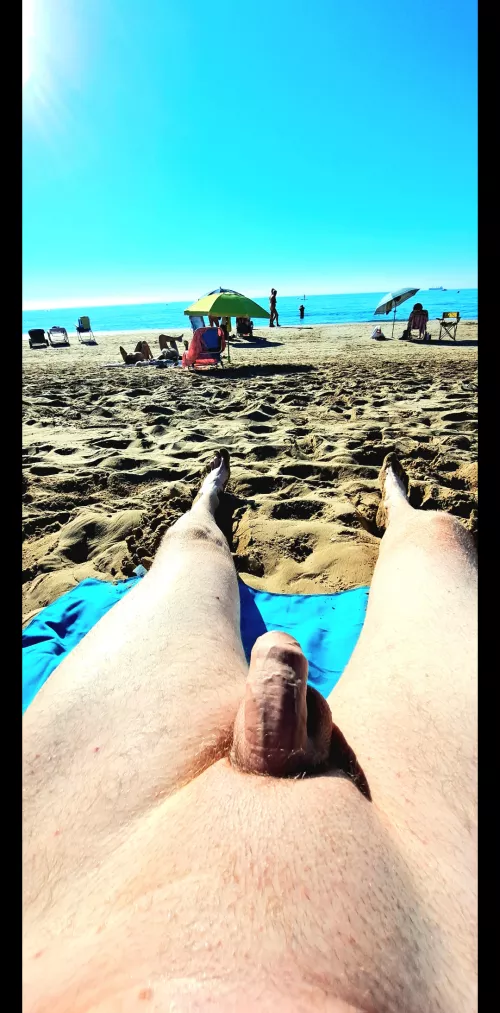 Relaxing, listening to the waves on the shore while soaking up the precious vitamin D. ☀️