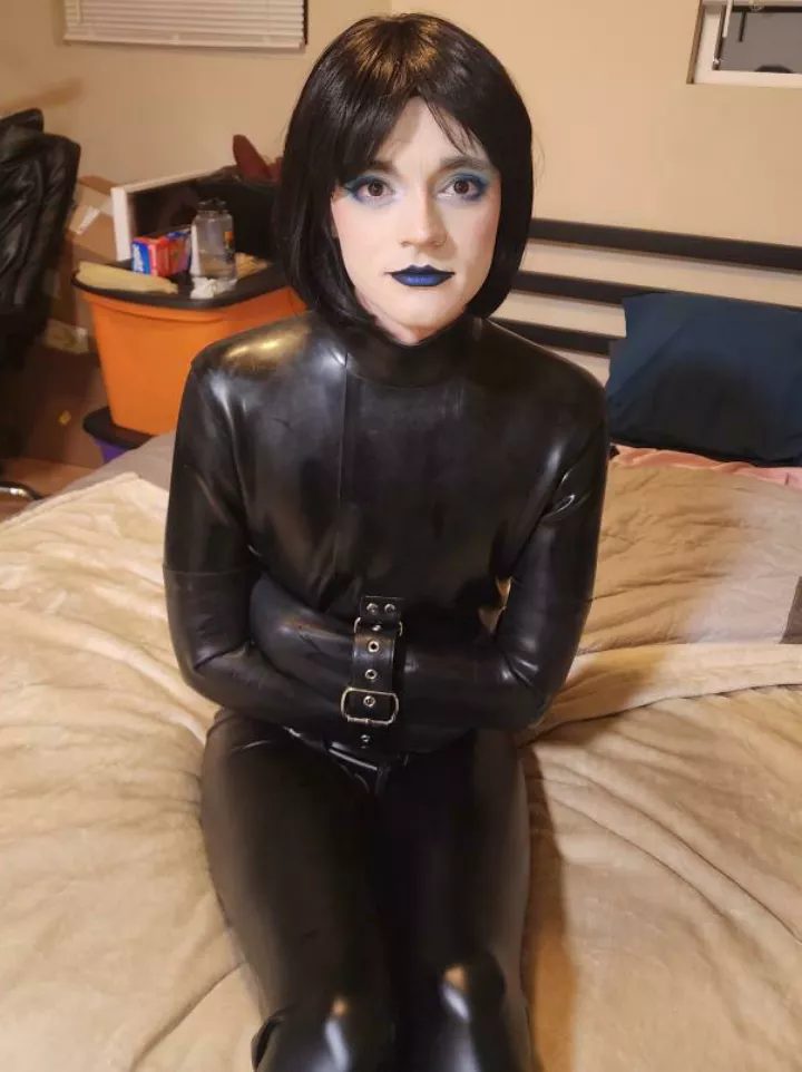 Rubber straitjacket strapped tight
