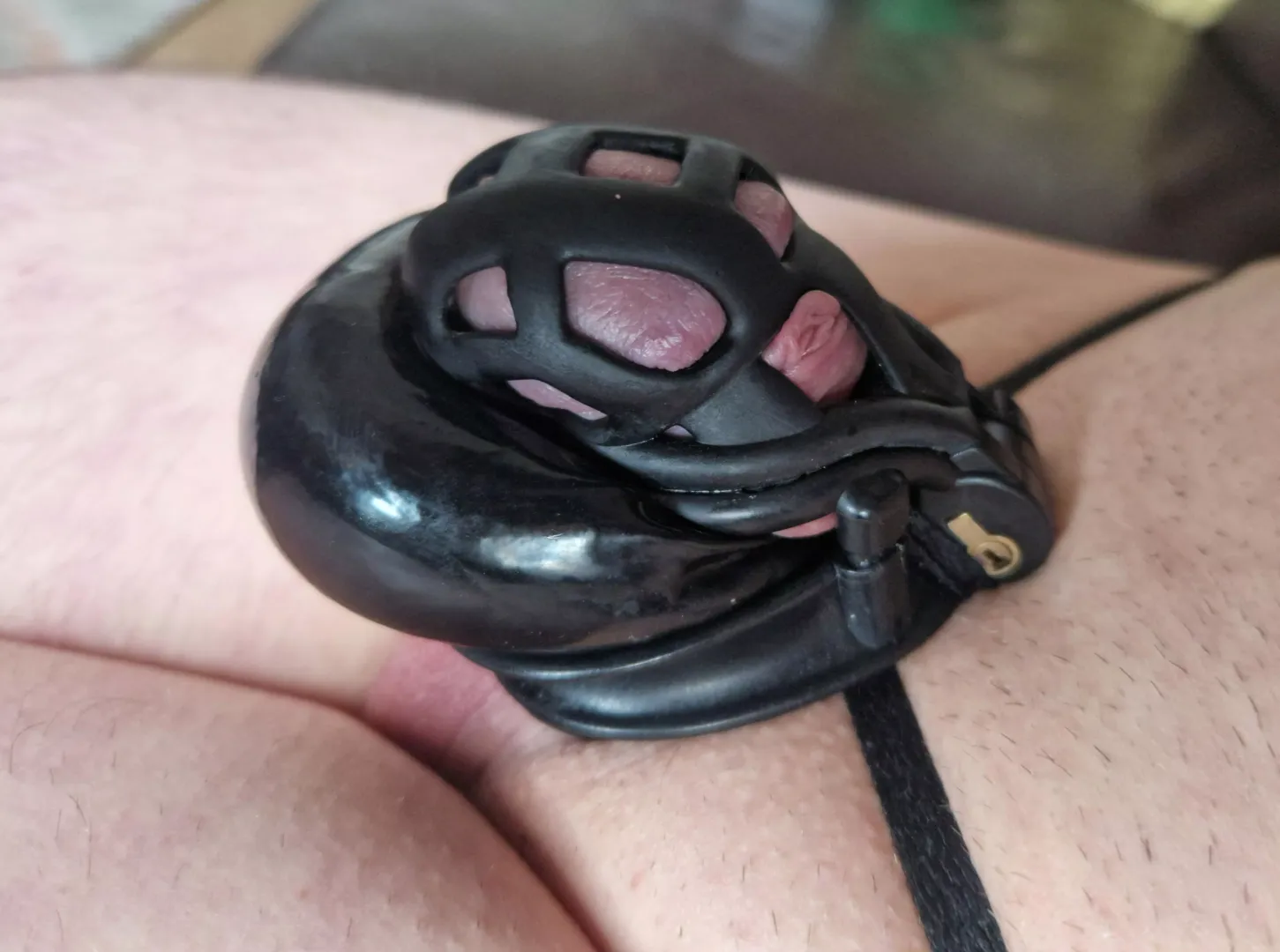 Shiny locked clitty and balls