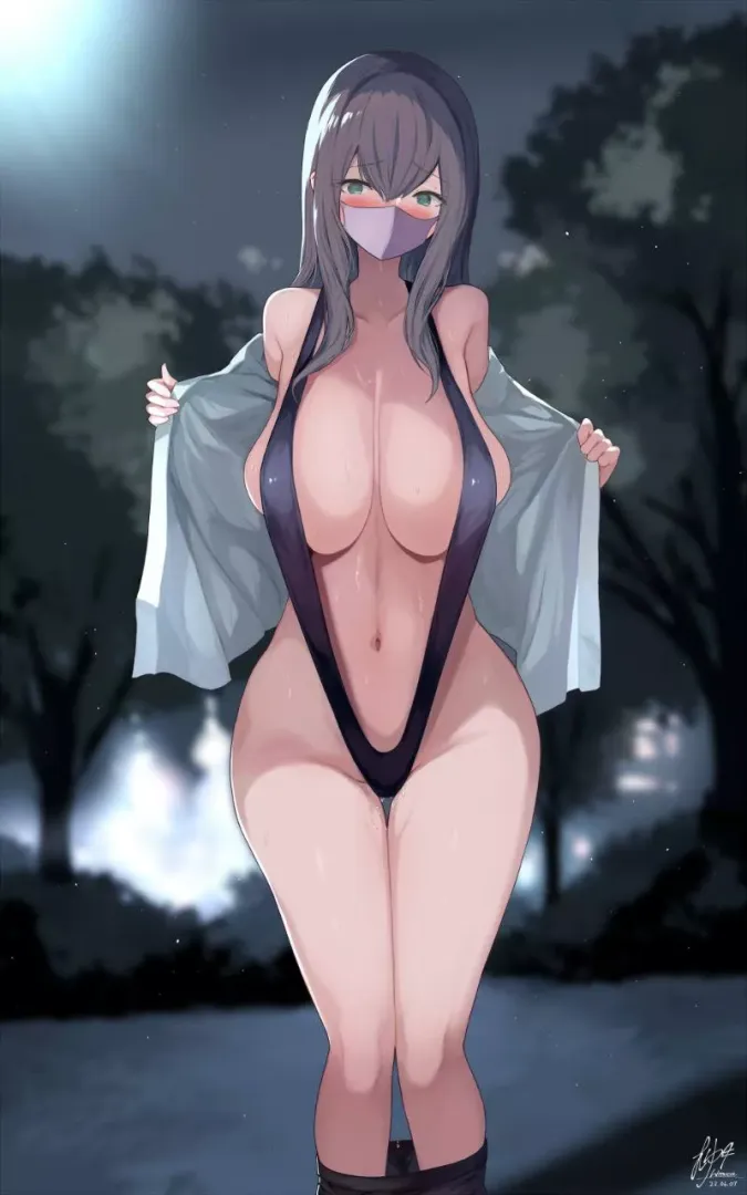 Showing off her swimsuit at park