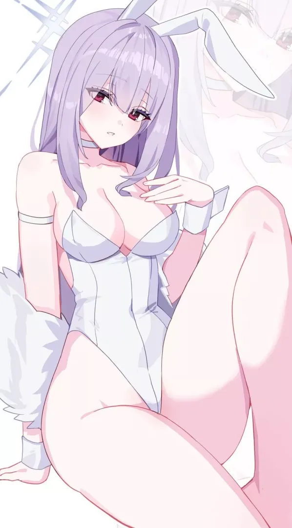 Showing off her white bunny suit 
