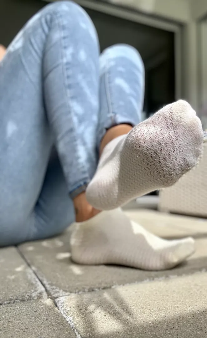 Showing off my cute, lightly see-through socks on the balcony