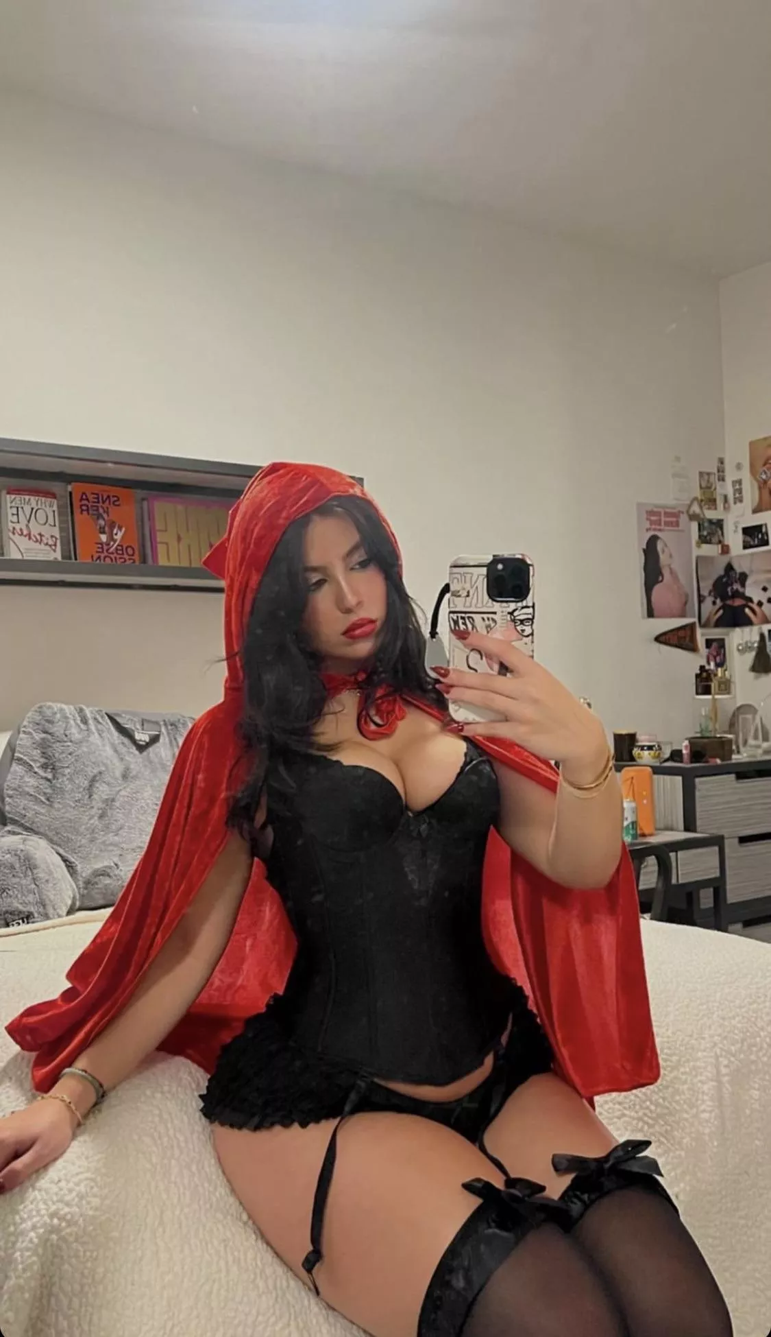 Sitting pretty in red cloak