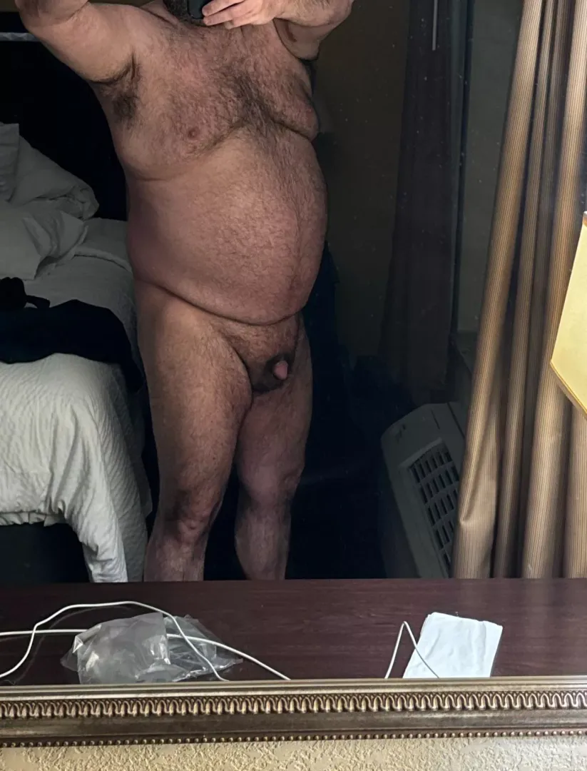 Standing in front of the hotel window 