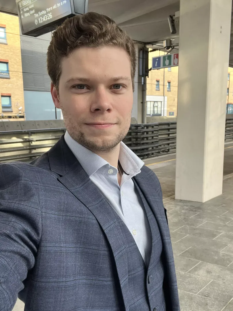 Suited up for office Christmas party. Love a three-piece.