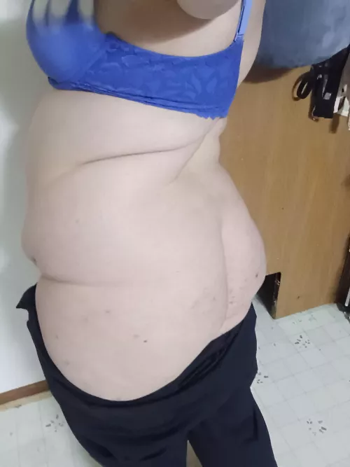 taking my scrubs off after a very long day happy to be home!!