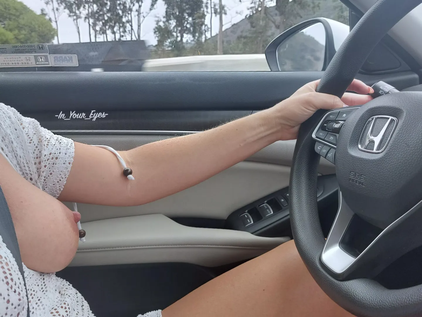 Taking out my tit while I drive