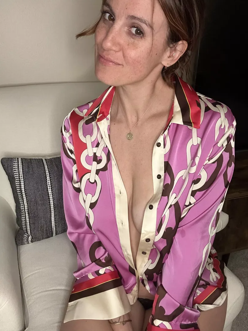 Teasing smile.