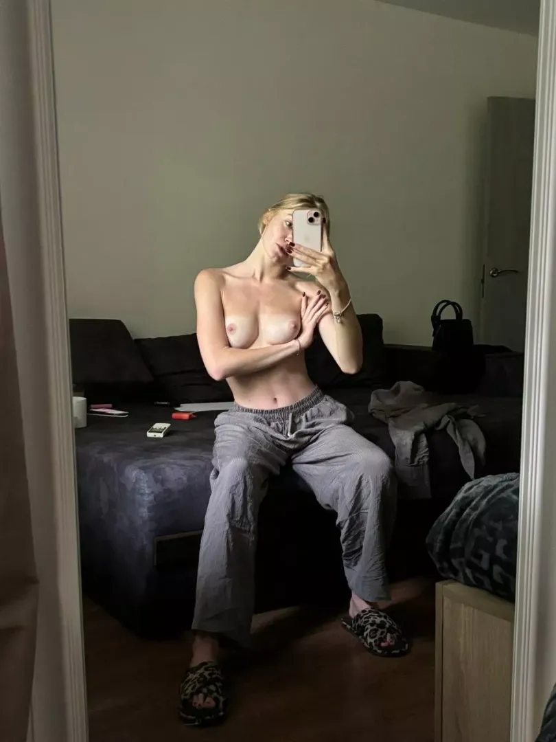 The slender blonde decided to photograph herself in the mirror
