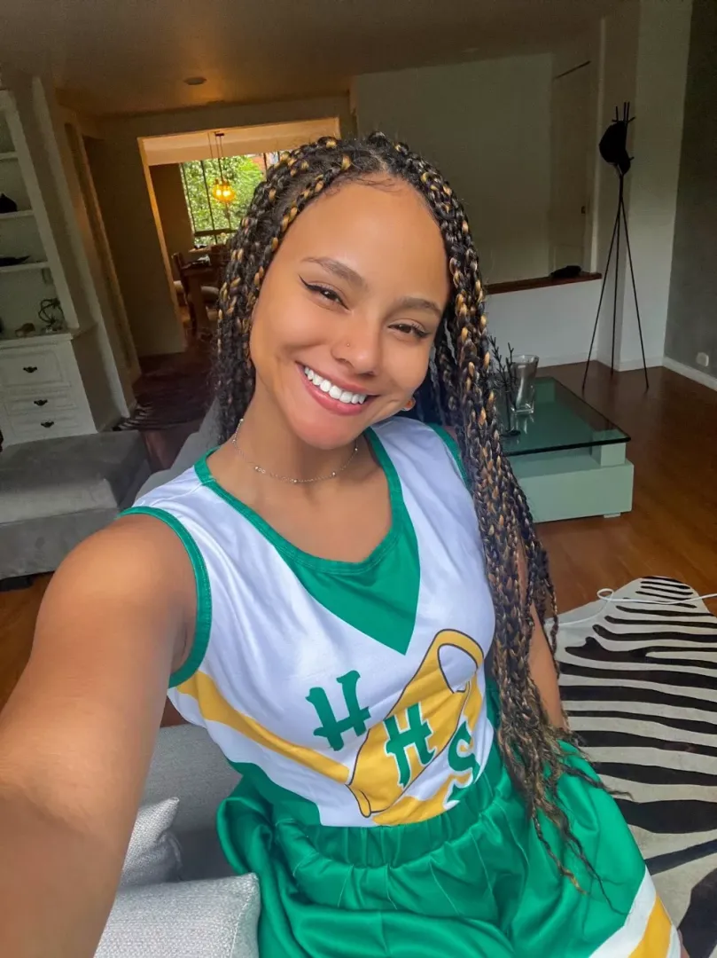 This cute cheerleader with braids is ready to slay!
