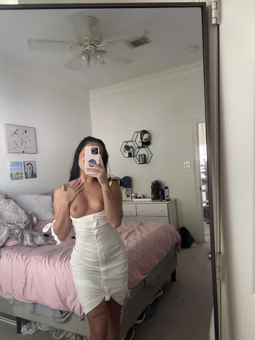 This white dress is nice but it would look even better on the floor
