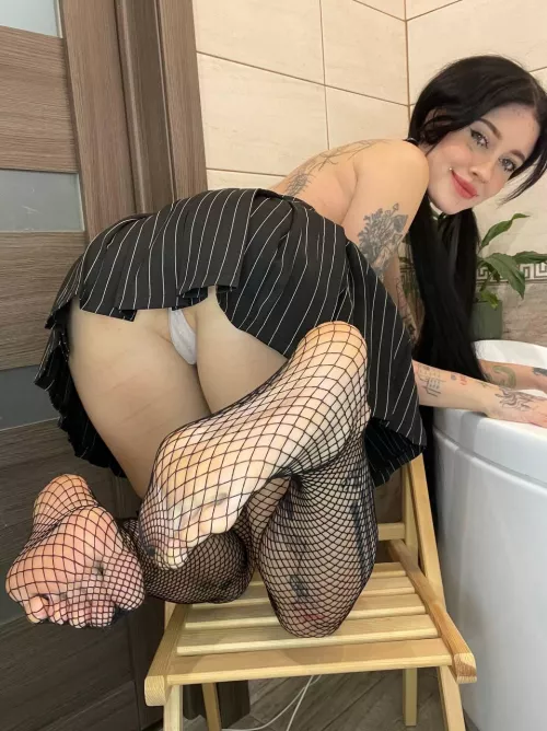 those fishnet tights look really perfect on you, don't they