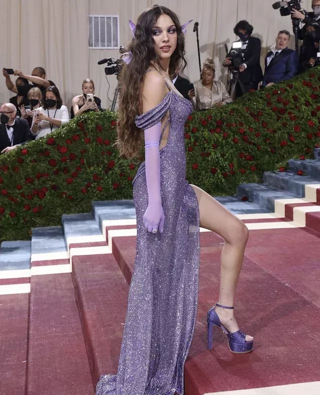 Throbbing at the thought of sharing Olivia Rodrigo's perfect legs with a bi bud