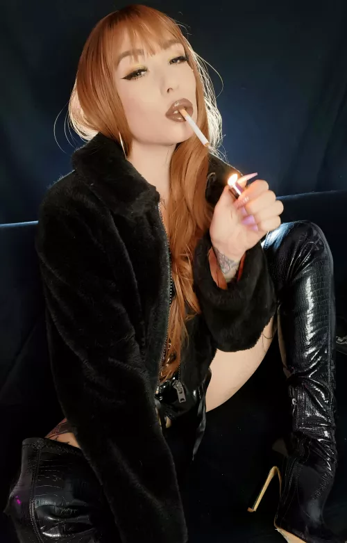 Tight, shiny boots and fur has to be the best combo