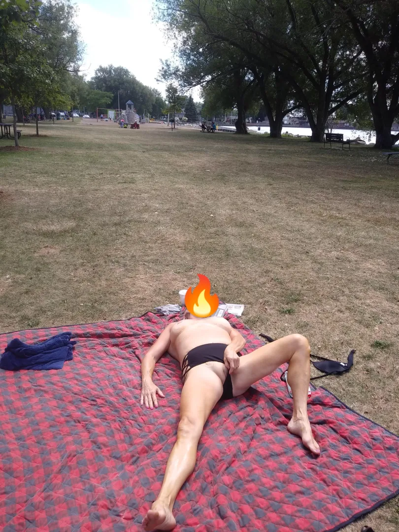 Topless and flashing at a public beach