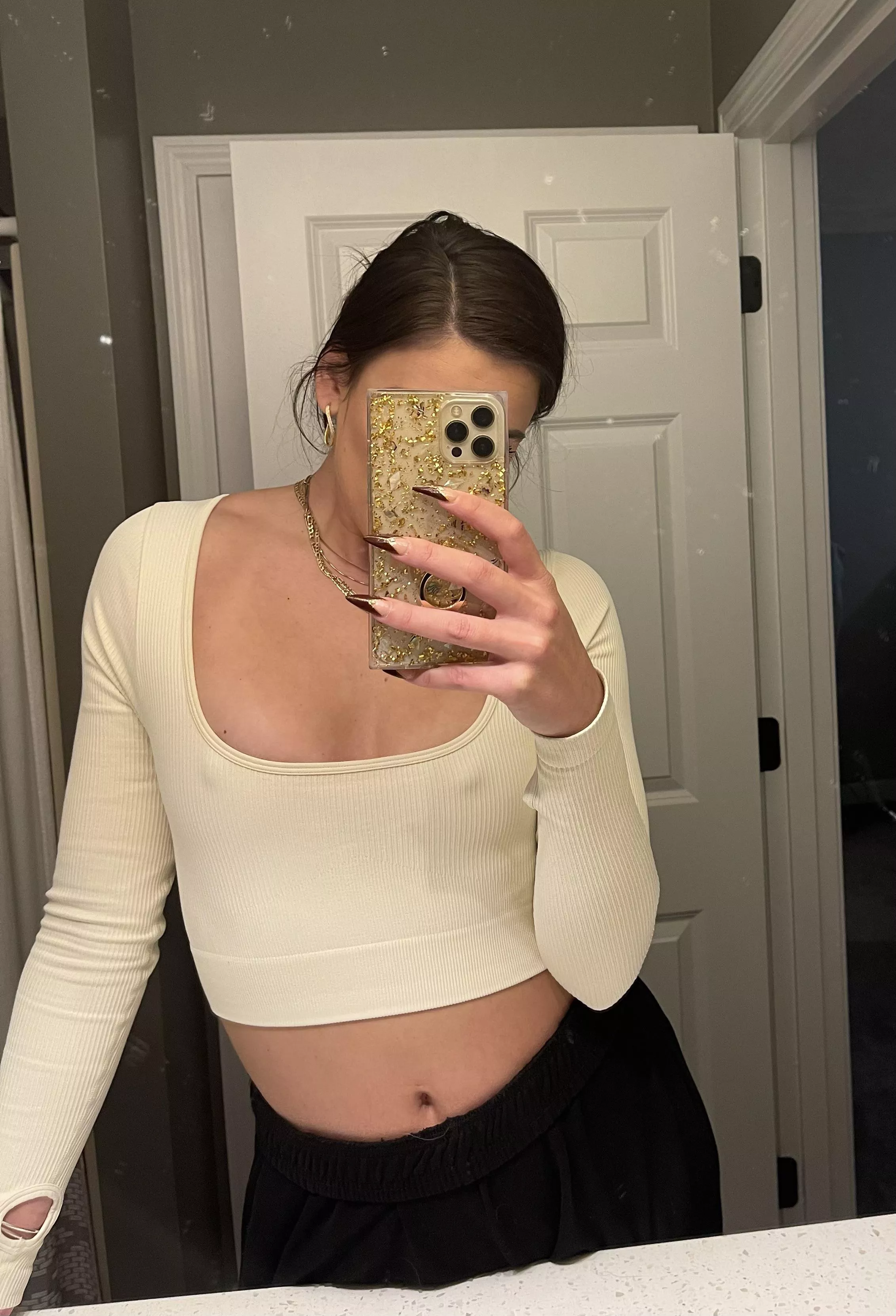 Two rolls of quarters under my shirt.