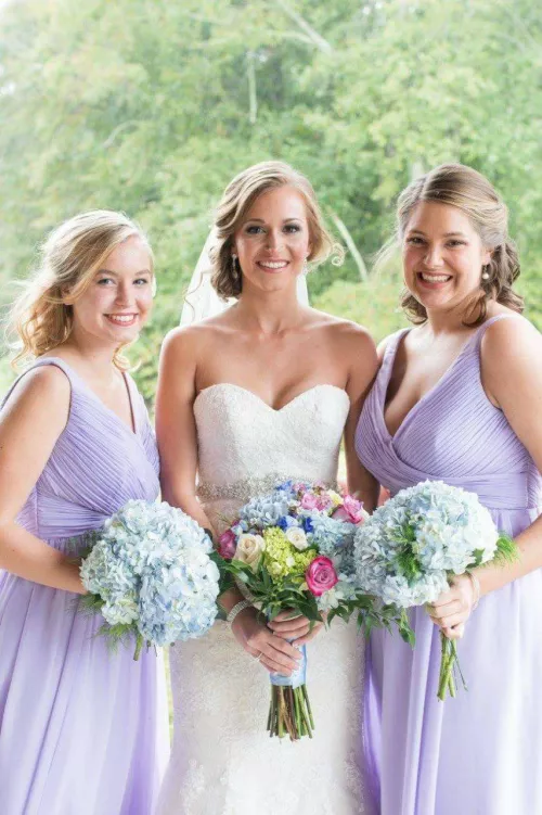 Two sisters and a bonus thicc bridesmaid...