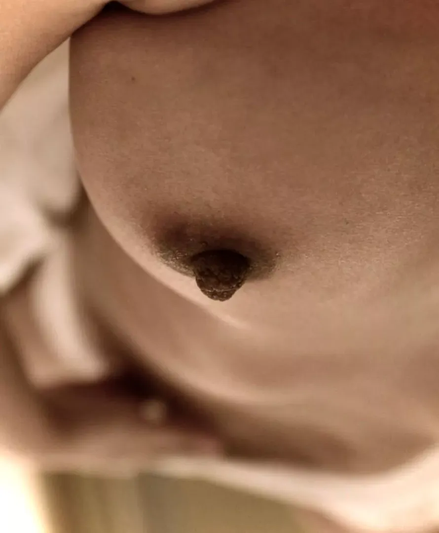 Wandering hands and big dark nipples