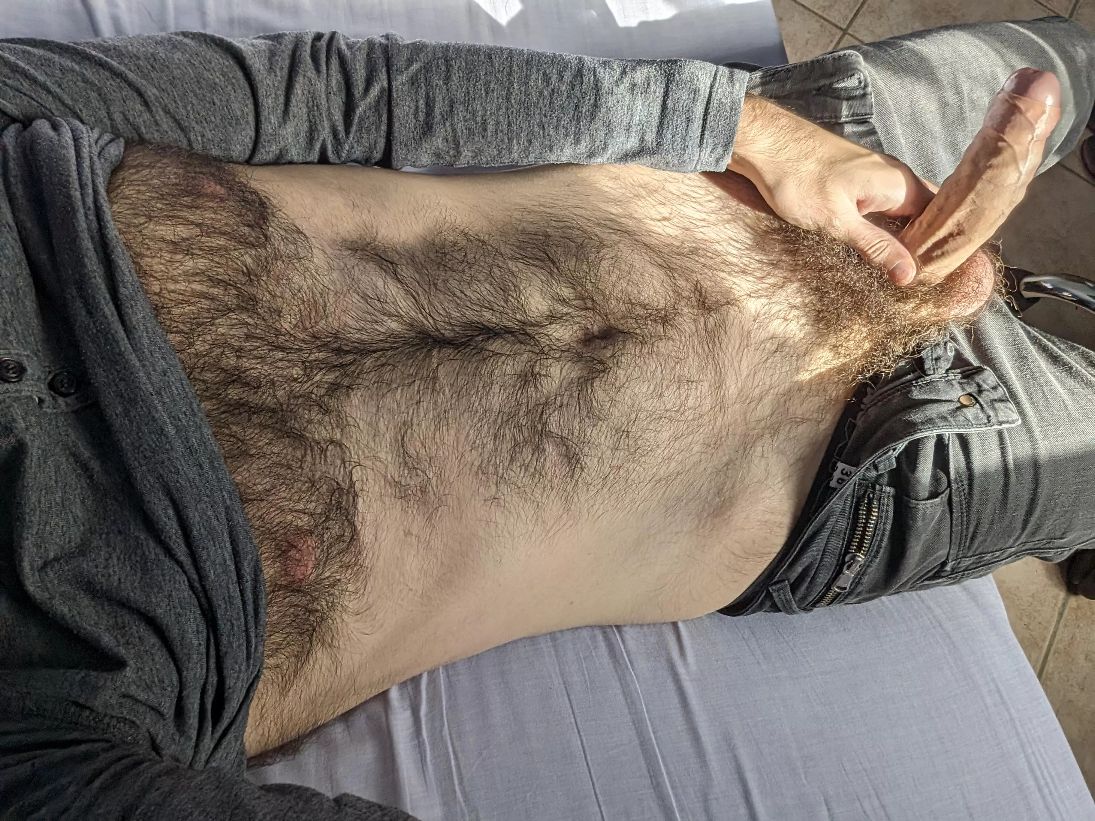 What grabs your attention first? The hairy chest or the dick?