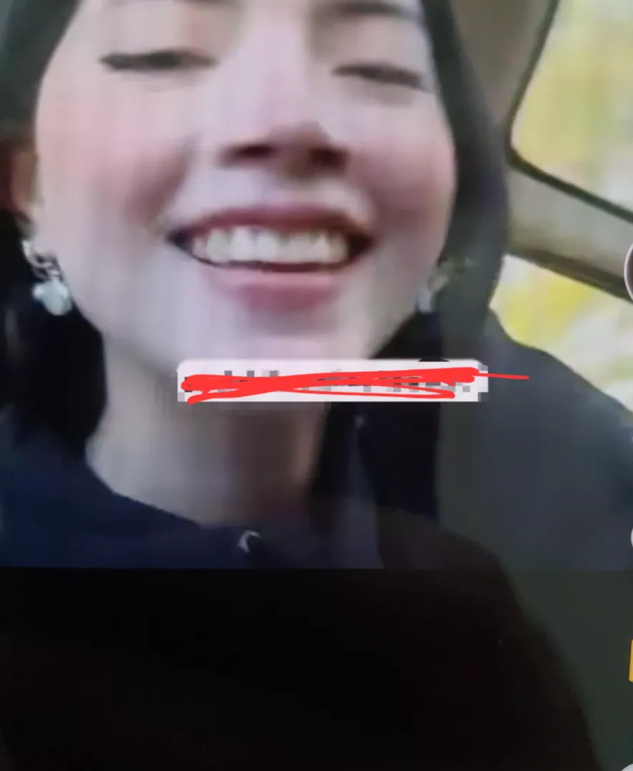 Who is she?