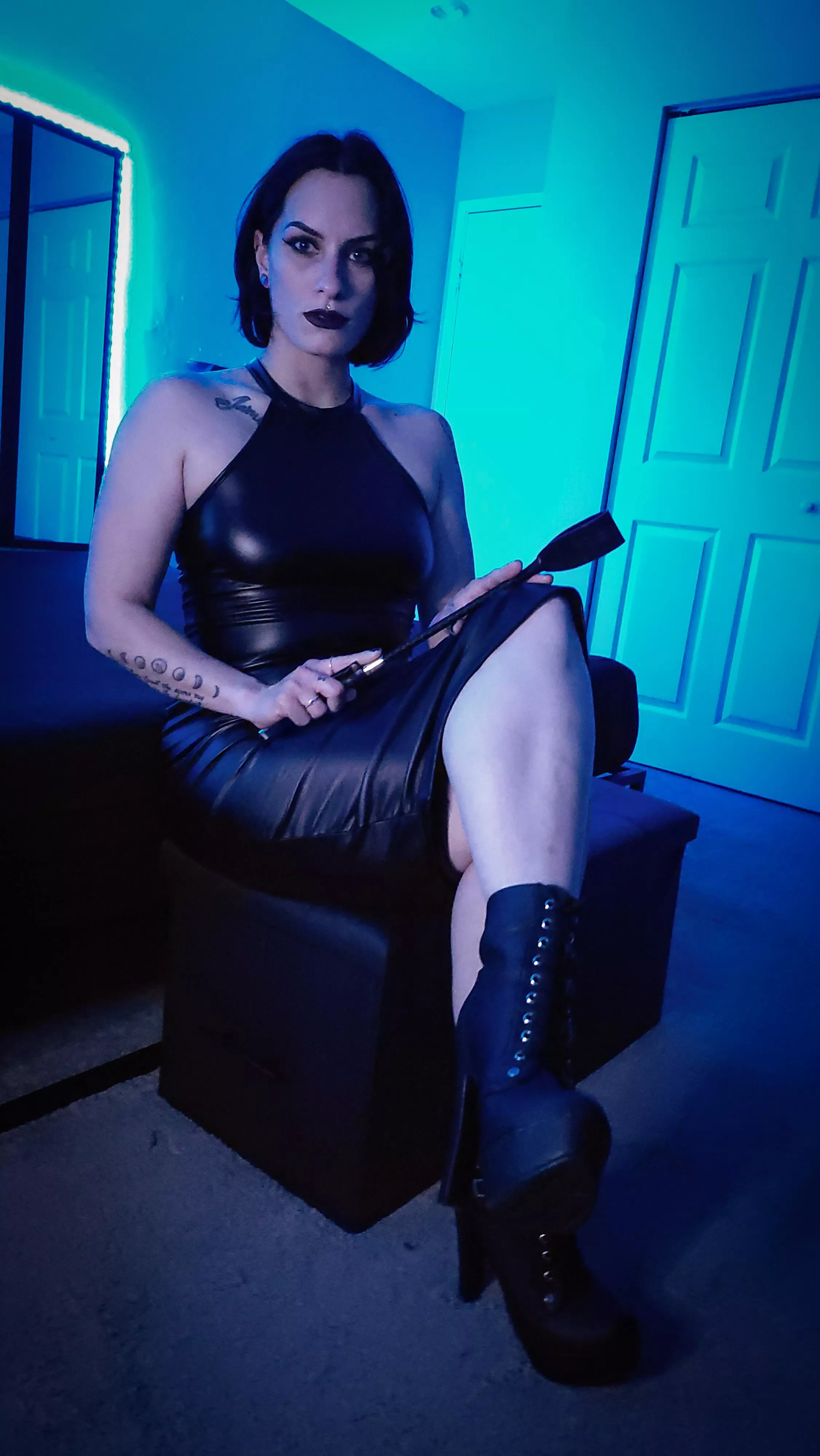 Who wouldn't want to be dominated by a Goddess wearing a leather dress?