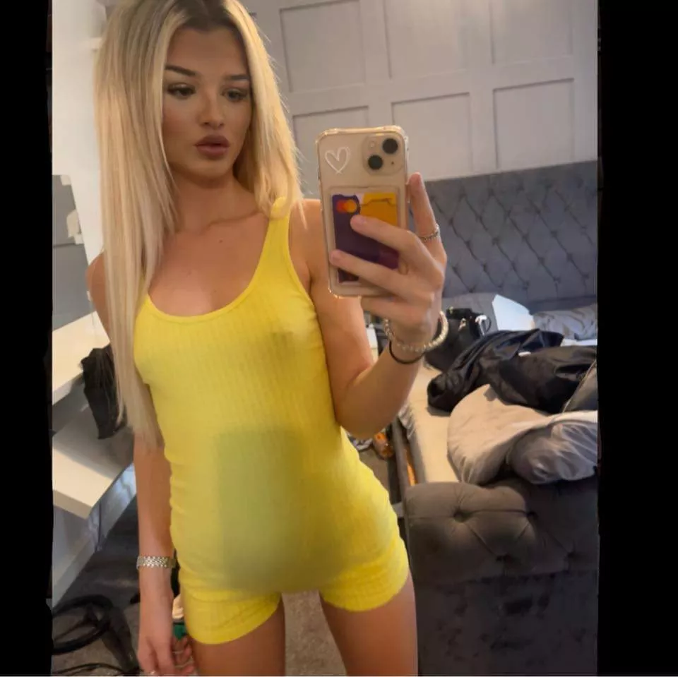 Yellow nipple piercing